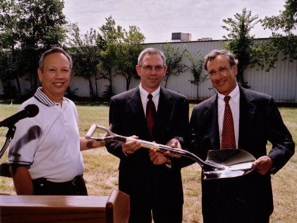 Glenn Smith holding a shovel to break ground on a new Mouser headquarters